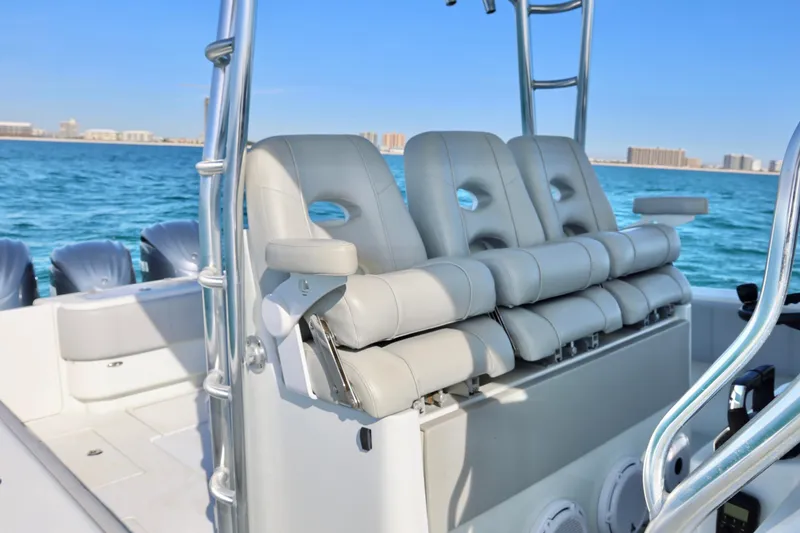 Slide: The Image of 2022 Contender 39 Fisharound boat with luxurious seating on open water. - 13