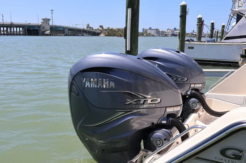Slide: The Image of Twin Yamaha XTO Offshore engines on a 2021 Grady-White Canyon 336 boat. - 19