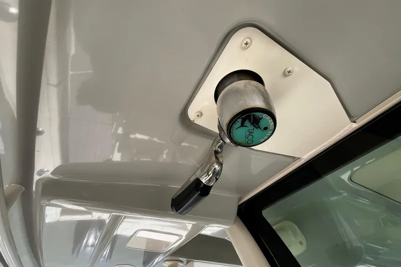 Slide: The Image of 2021 Grady-White Canyon 336 boat detail, featuring a mounted handle and logo. - 41