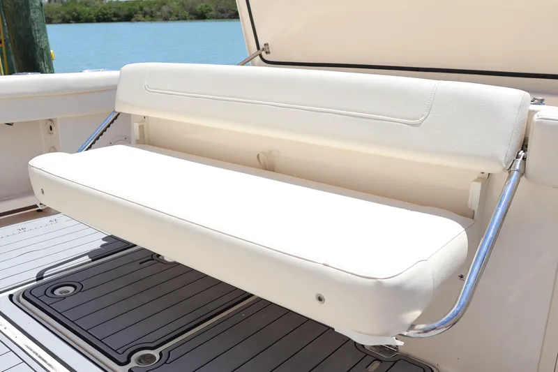 Slide: The Image of 2021 Grady-White Canyon 336 boat with foldable white bench seat. - 45