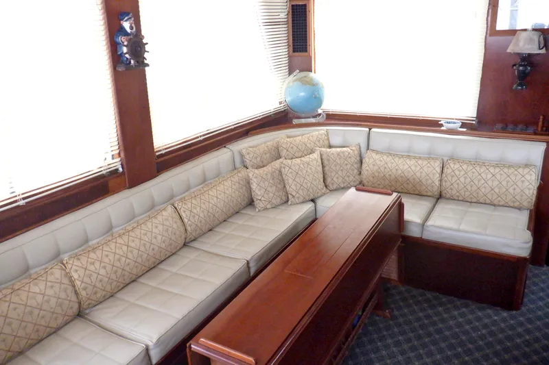 Slide: The Image of Luxurious interior of 1980 Grand Banks 49 Classic yacht with plush seating and nautical decor. - 16