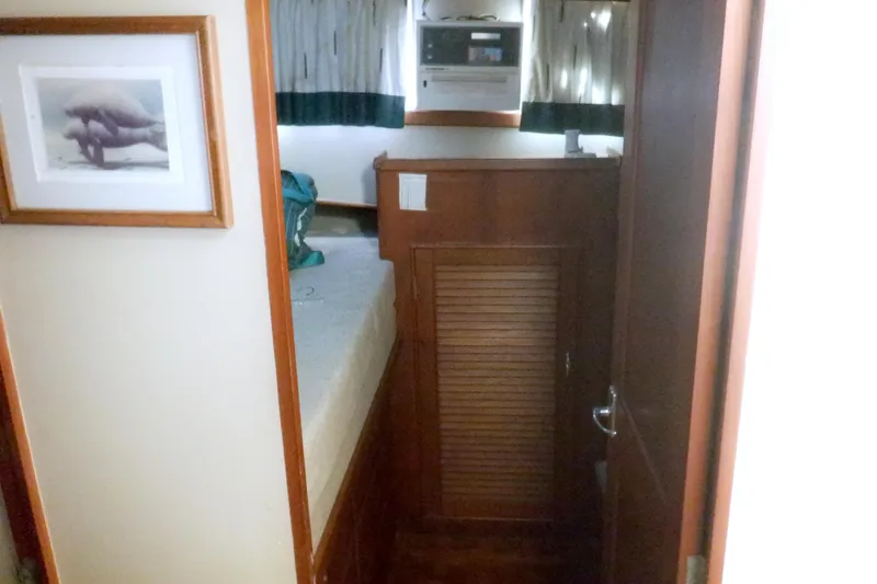 Slide: The Image of Interior cabin of 1980 Grand Banks 49 Classic yacht with wooden furnishings. - 31