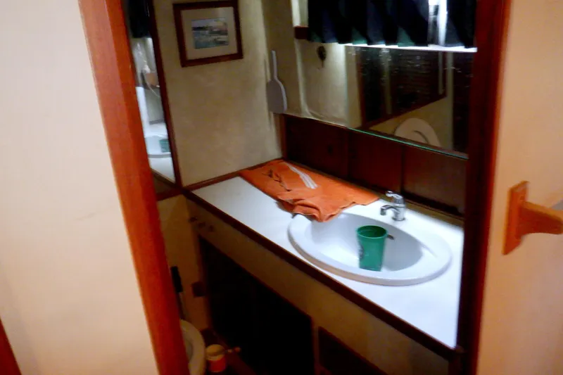 Slide: The Image of Bathroom interior of 1980 Grand Banks 49 Classic yacht with sink and mirror. - 40