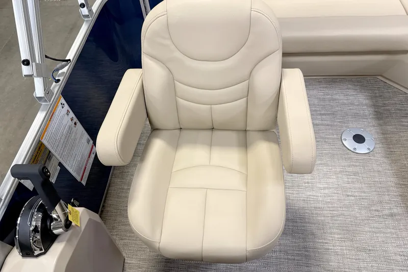 Slide: The Image of Beige captain's chair in 2026 Godfrey EX 1880 CX boat interior. - 7