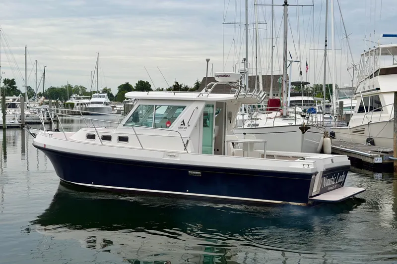 The Image of 2006 Albin 28 Tournament Express boat docked in a marina. - 0