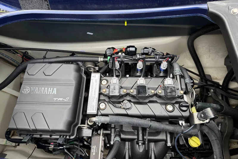 Slide: The Image of 2020 Yamaha WaveRunner VX Deluxe engine compartment, showcasing TR-1 engine components and wiring. - 13