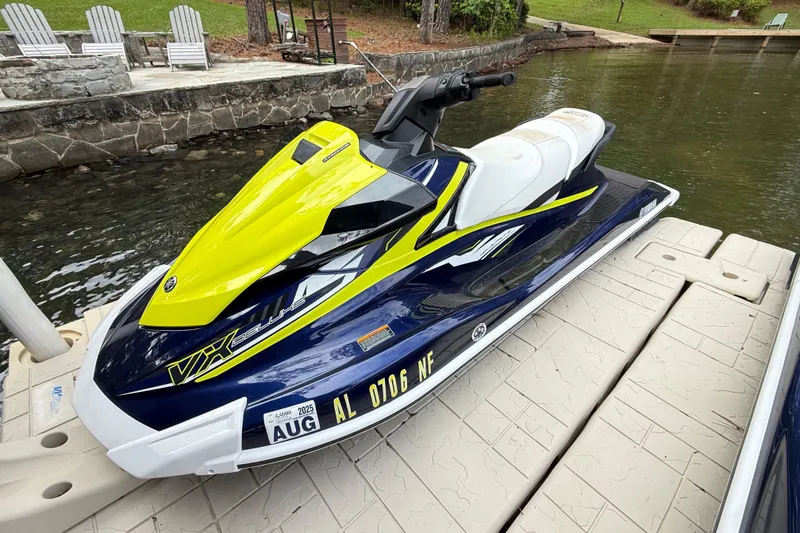 Slide: The Image of 2020 Yamaha WaveRunner VX Deluxe jet ski docked by a lakeside. - 8