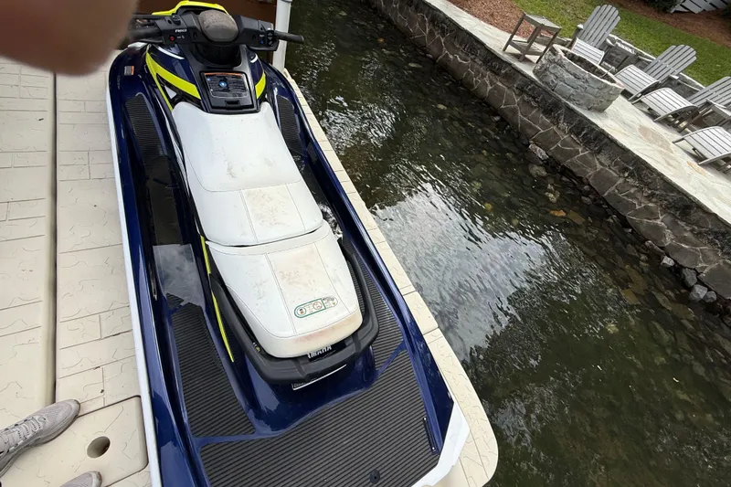 Slide: The Image of 2020 Yamaha WaveRunner VX Deluxe on dock beside stone-lined waterway. - 9