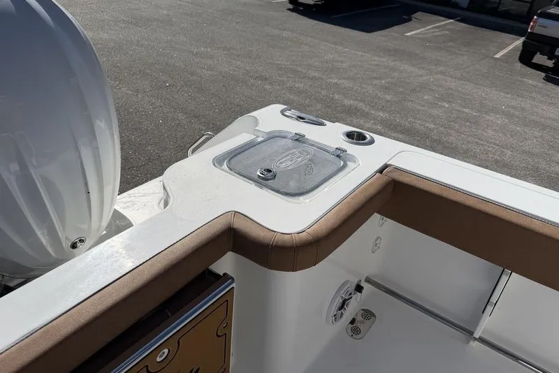 Slide: The Image of 2026 Sea Hunt Gamefish 27 boat interior with seating and storage features. - 9