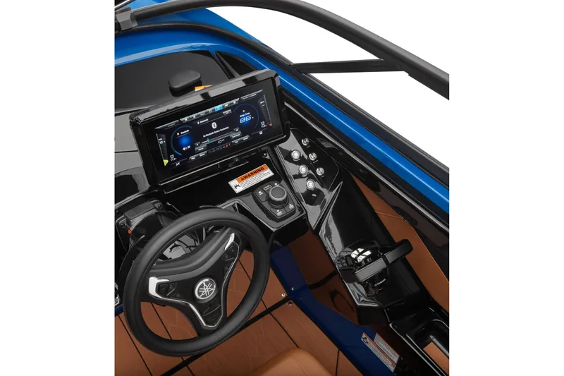 Slide: The Image of 2026 Yamaha Boats 255XD dashboard with steering wheel and digital display. - 17