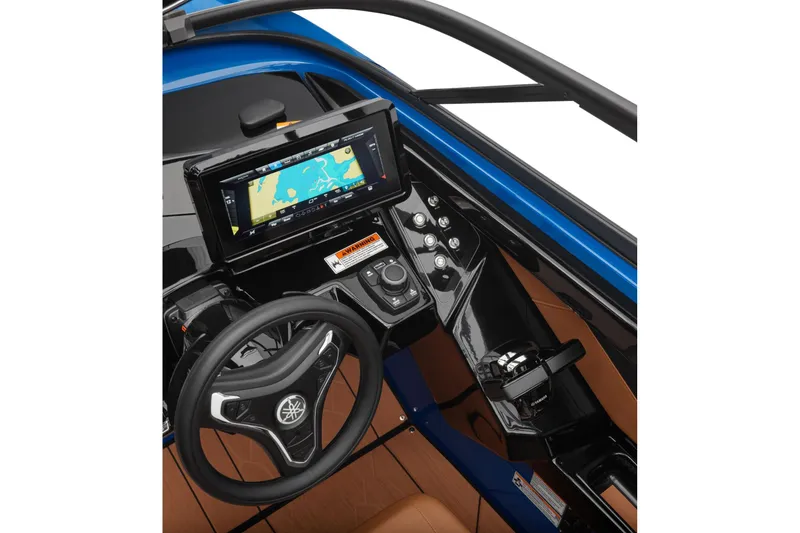 Slide: The Image of 2026 Yamaha Boats 255XD dashboard with steering wheel and navigation display. - 37