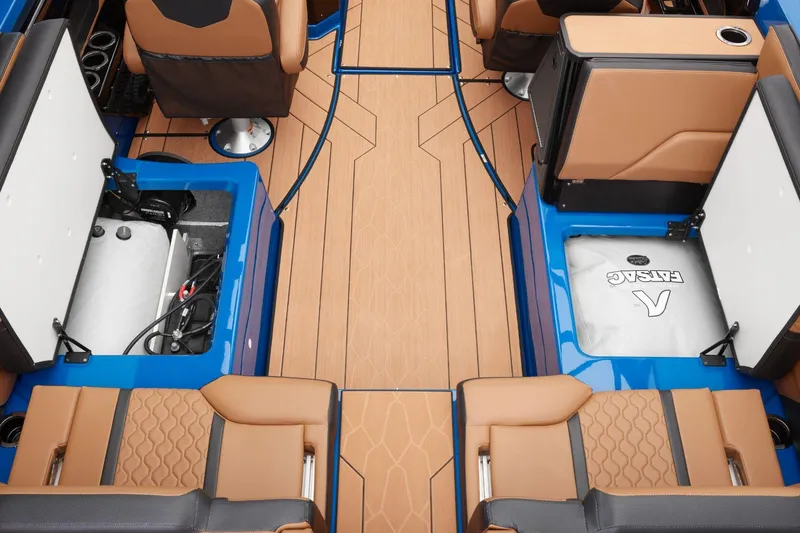Slide: The Image of 2026 Yamaha Boats 255XD interior with tan seats and storage compartments open. - 41