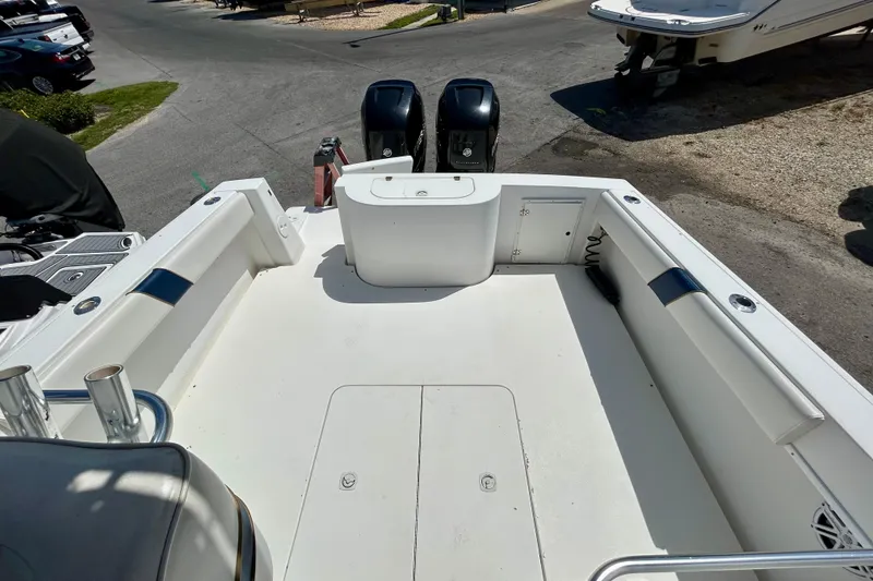 Slide: The Image of 2001 Contender 35 Side Console boat deck with twin outboard motors. - 5