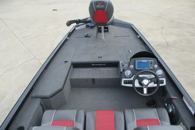 Slide: The Image of 2018 Ranger RT178 boat interior with steering console and seating. - 1