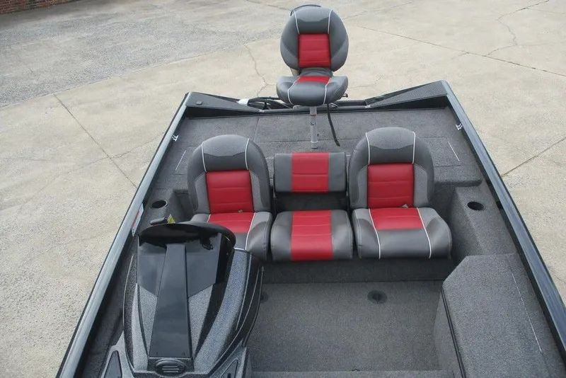 Slide: The Image of 2018 Ranger RT178 boat interior with gray and red seating arrangement. - 2