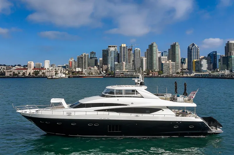 Slide: The Image of Luxury 2011 Princess 95 Motor Yacht cruising near city skyline. - 2