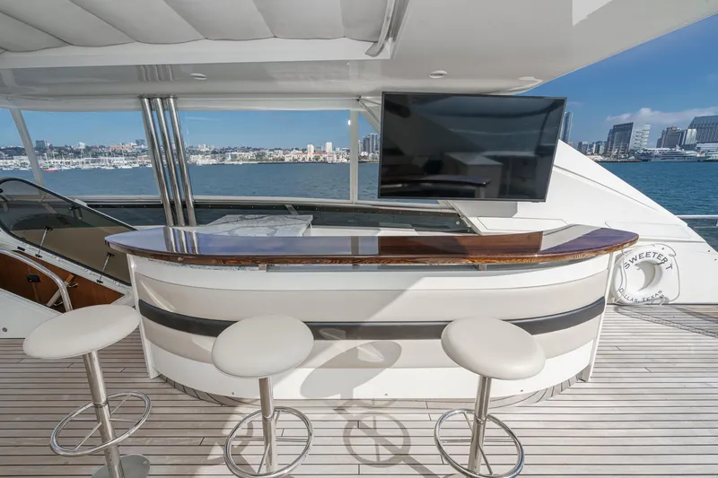 Slide: The Image of Luxurious 2011 Princess 95 Motor Yacht with elegant bar and scenic ocean view. - 26