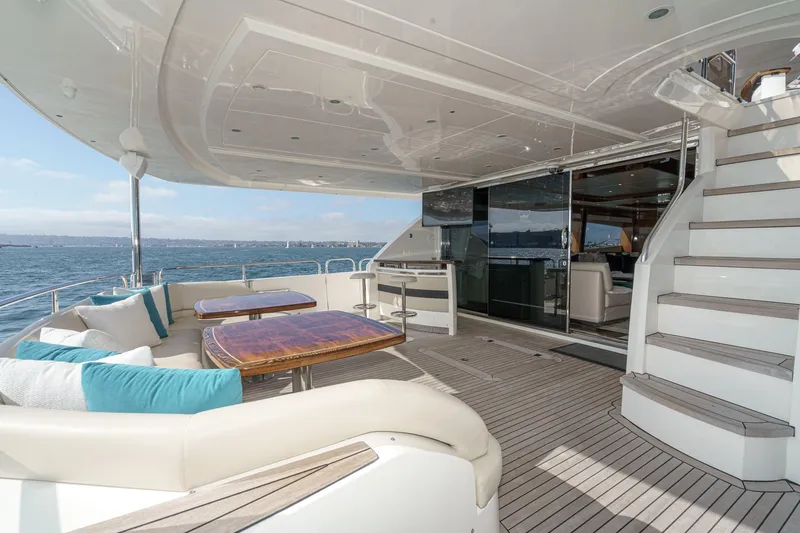 Slide: The Image of Luxurious 2011 Princess 95 Motor Yacht deck with elegant seating and ocean view. - 34