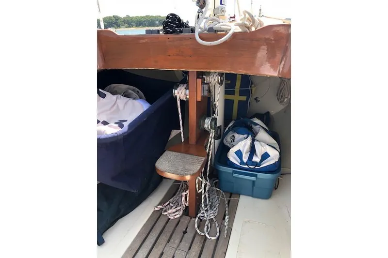 Slide: The Image of 1963 Cape Cod Shipbuilding Shields sailboat interior with ropes and storage. - 11