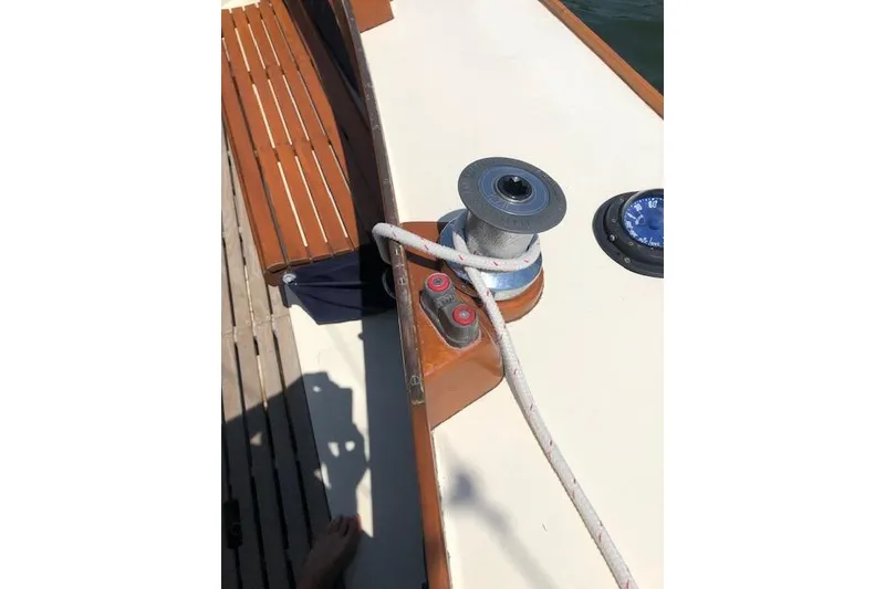 Slide: The Image of Deck of 1963 Cape Cod Shipbuilding Shields sailboat with winch and rope. - 16