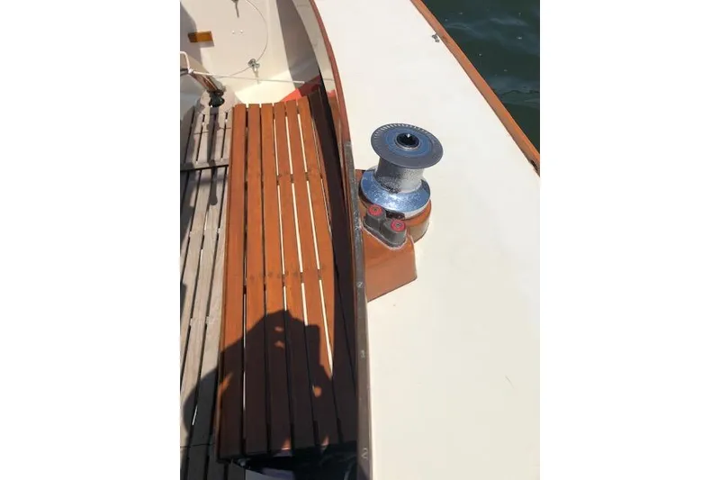 Slide: The Image of Wooden deck of 1963 Cape Cod Shipbuilding Shields sailboat with winch. - 17