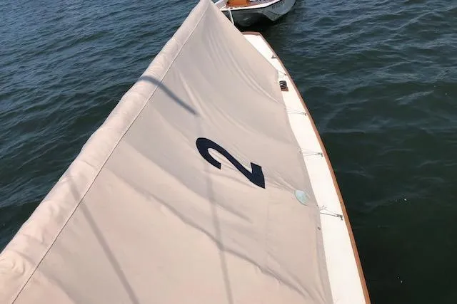 Slide: The Image of Sailboat on water, Cape Cod Shipbuilding Shields model, 1963, with visible sail number 2. - 19