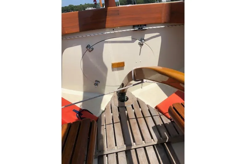 Slide: The Image of Interior of a 1963 Cape Cod Shipbuilding Shields sailboat with wooden seating and flooring. - 23