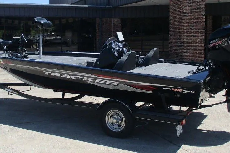 The Image of 2019 Tracker Pro Team 195 TXW boat parked outside a building. - 0
