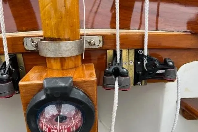 Slide: The Image of Compass and rigging on a 1981 Edey & Duff Doughdish sailboat. - 7
