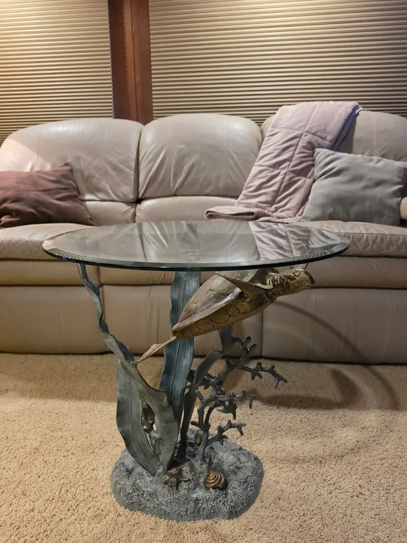 Slide: The Image of Glass coffee table with turtle design in front of leather sofa, 1994 Gibson 47 Executive. - 12