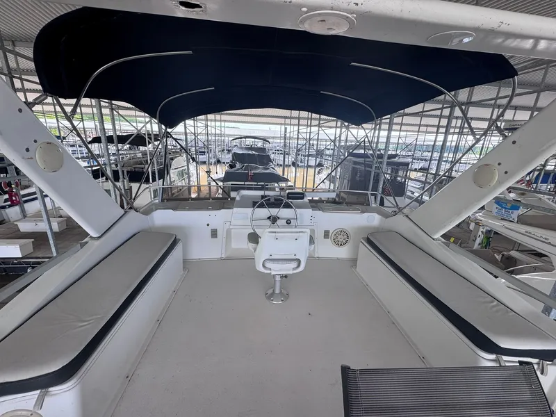 Slide: The Image of Gibson 47 Executive 1994 yacht cockpit with seating and helm station. - 21