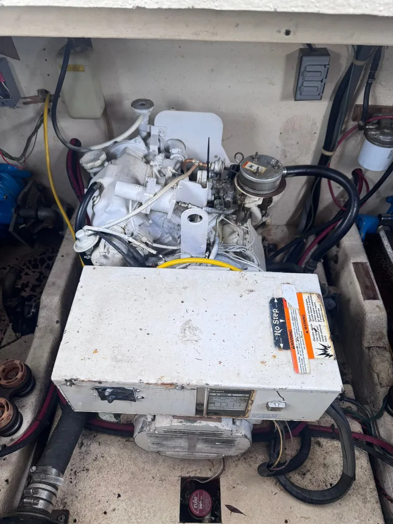 Slide: The Image of Engine compartment of a 1994 Gibson 47 Executive. - 25