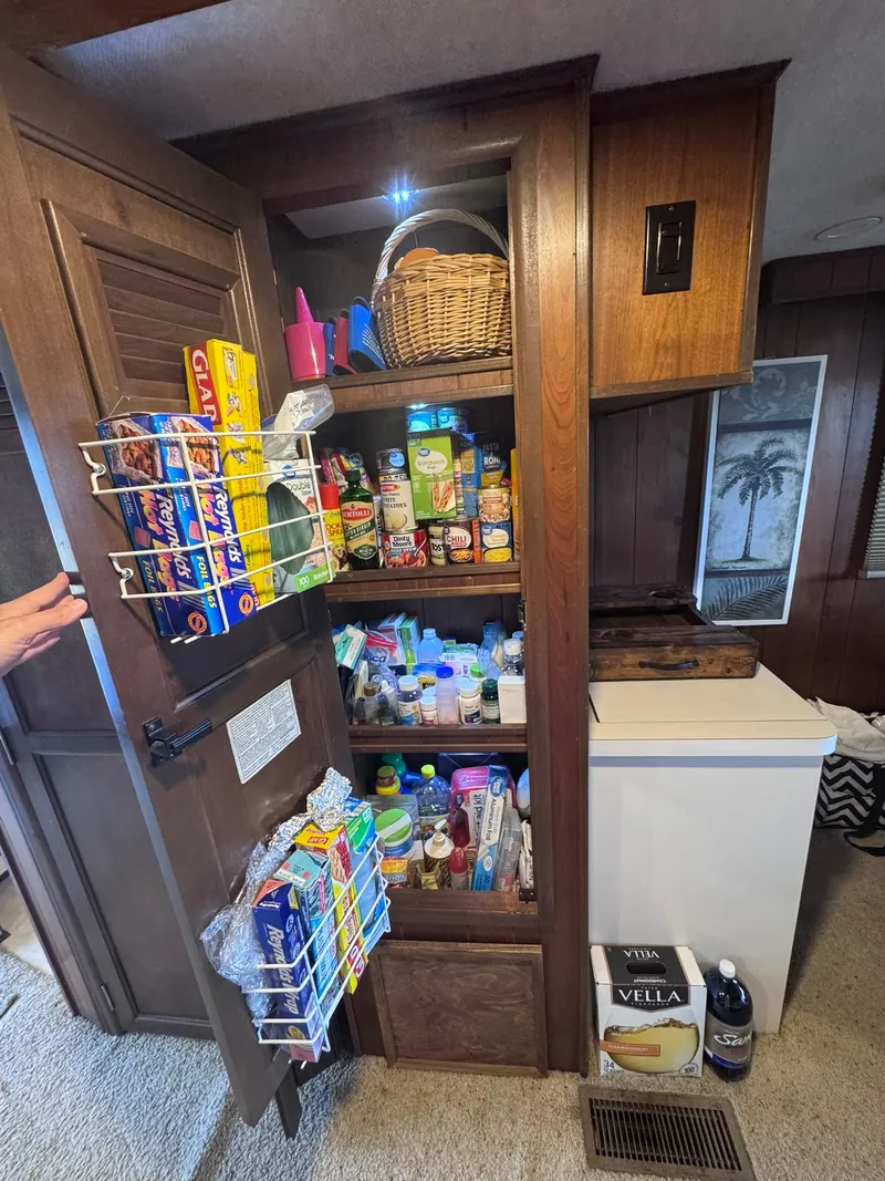 Slide: The Image of Pantry cabinet in a 1994 Gibson 47 Executive boat. - 30