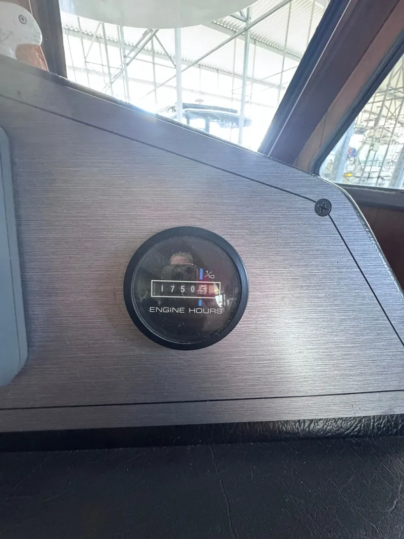 Slide: The Image of Gibson 47 Executive 1994 engine hours gauge at 1750.5 hours. - 31