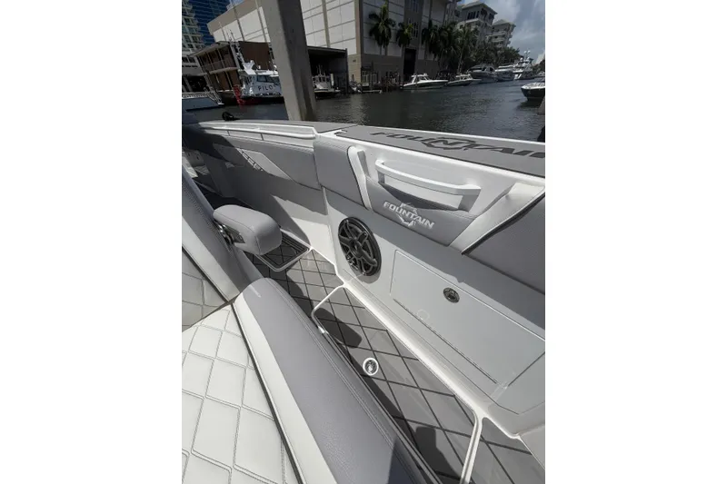 Slide: The Image of 2024 Fountain 38 SCX boat interior with sleek seating and modern design. - 13