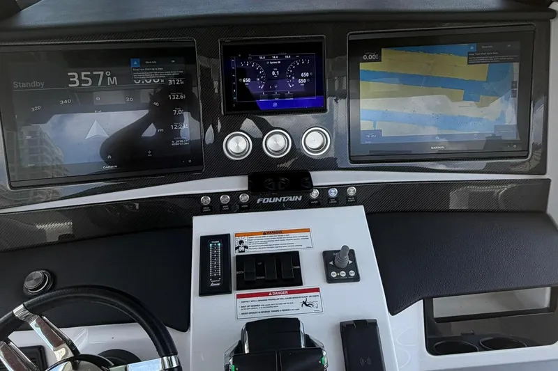Slide: The Image of 2024 Fountain 38 SCX dashboard with advanced navigation and control displays. - 4