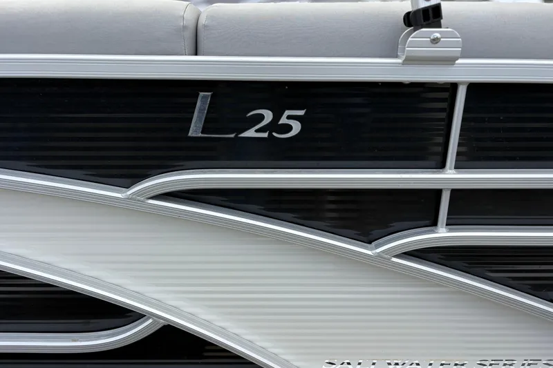 Slide: The Image of 2022 Bennington Saltwater Series L25 boat detail with sleek design and modern finish. - 8