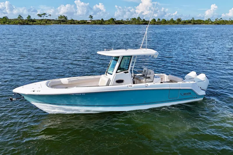 The Image of 2023 Boston Whaler 280 Outrage boat on calm water, showcasing sleek design and modern features. - 0