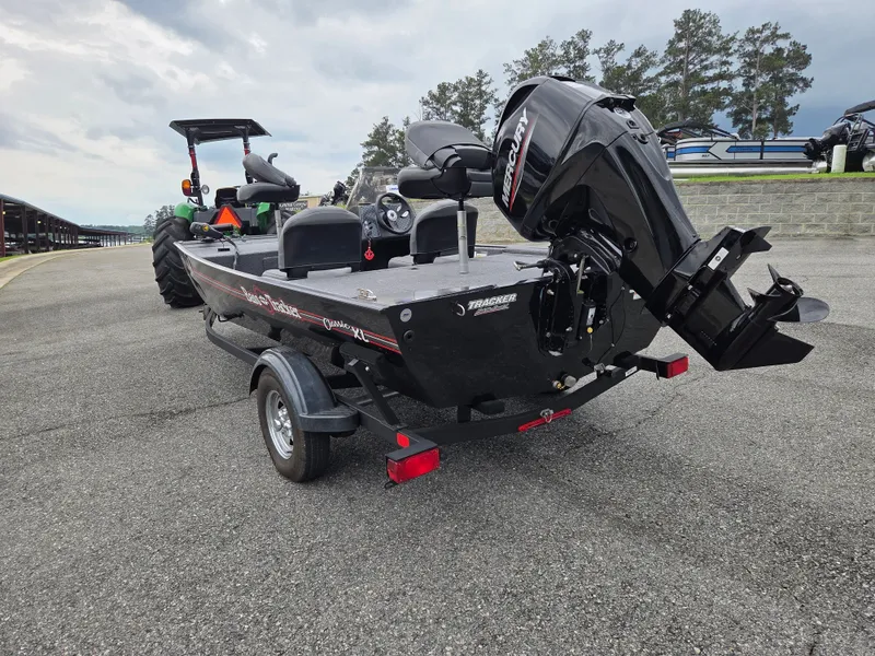 Slide: The Image of 2024 Tracker Bass Tracker Classic XL boat on trailer. - 3