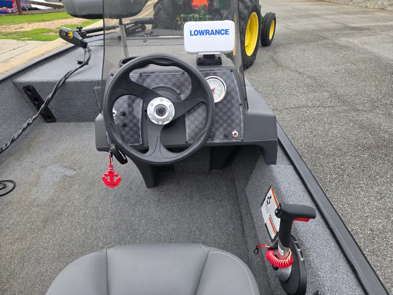 Slide: The Image of 2024 Tracker Bass Tracker Classic XL steering console with Lowrance display. - 5