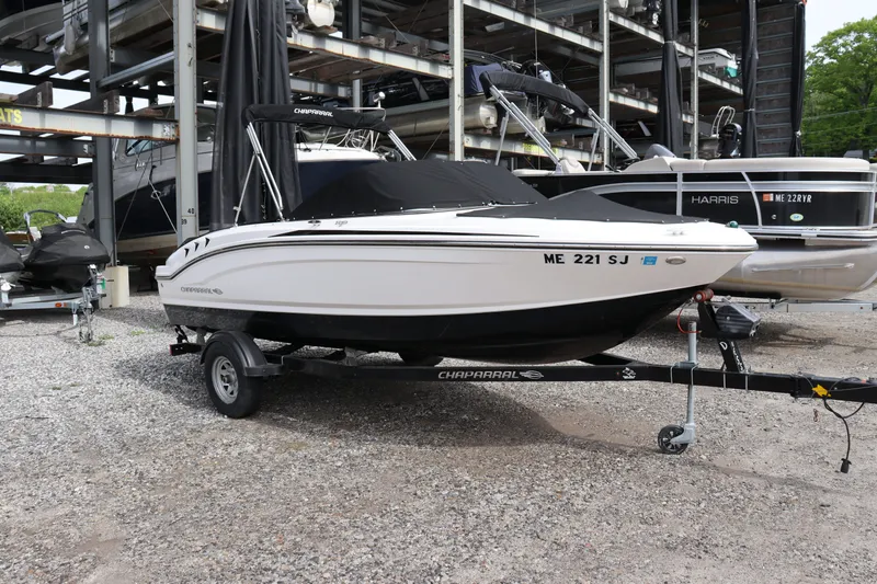 The Image of 2019 Chaparral 19 H2O boat on trailer in storage. - 1