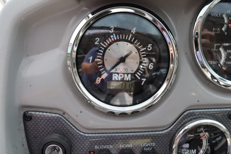 Slide: The Image of Tachometer of a 2019 Chaparral 19 H2O boat, displaying 1316 RPM. - 10