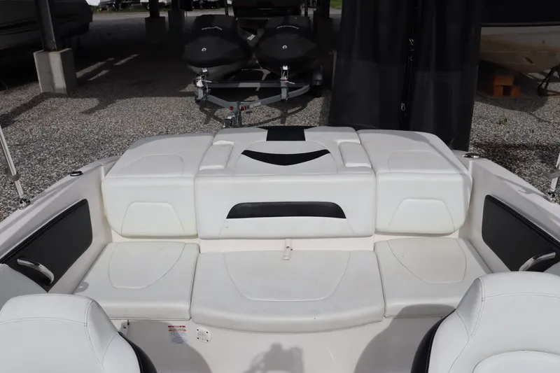 Slide: The Image of Interior of a 2019 Chaparral 19 H2O boat with white seating. - 12