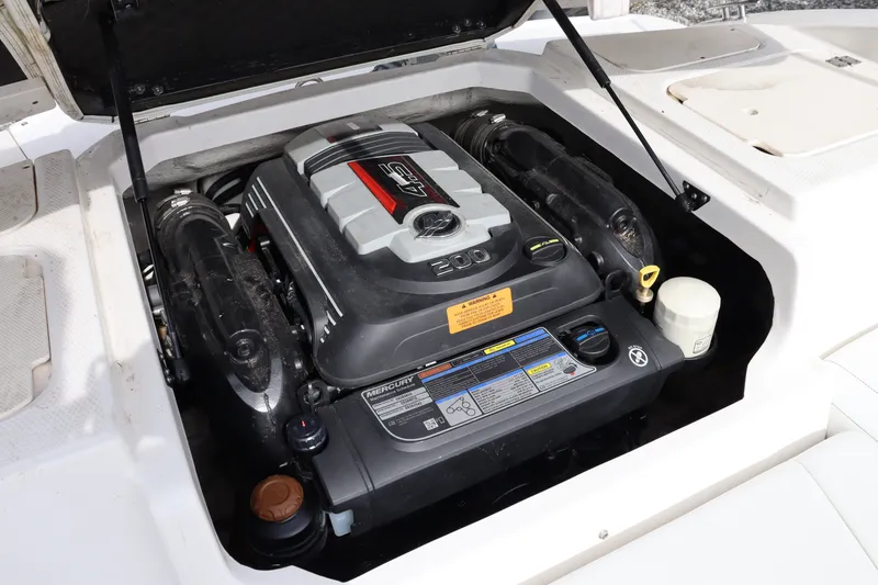 Slide: The Image of Engine compartment of 2019 Chaparral 19 H2O with Mercury engine. - 13