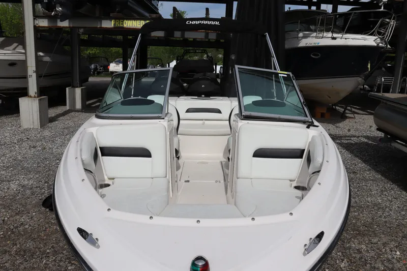 Slide: The Image of 2019 Chaparral 19 H2O boat in storage area. - 15