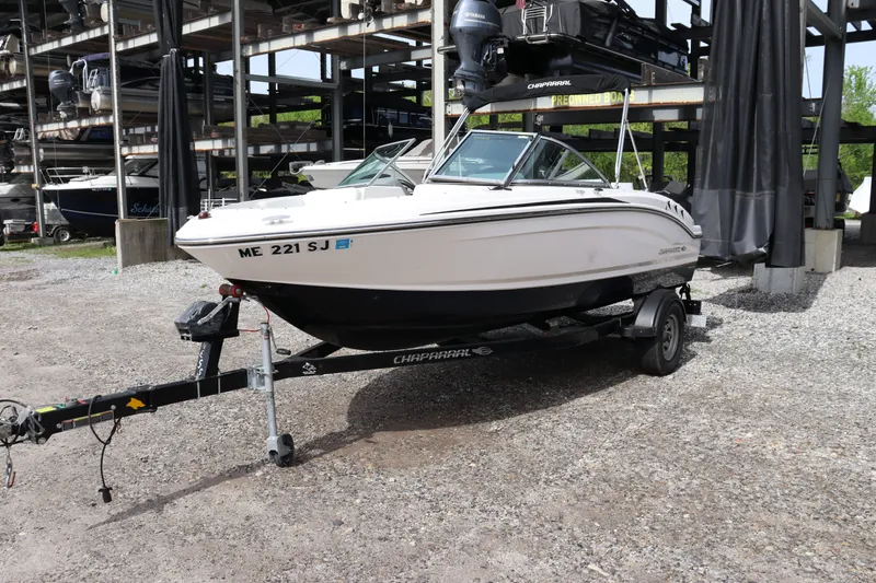 Slide: The Image of 2019 Chaparral 19 H2O boat on trailer outdoors. - 2