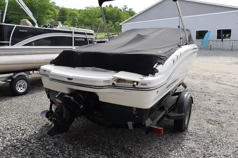 Slide: The Image of 2019 Chaparral 19 H2O boat with cover on trailer. - 3