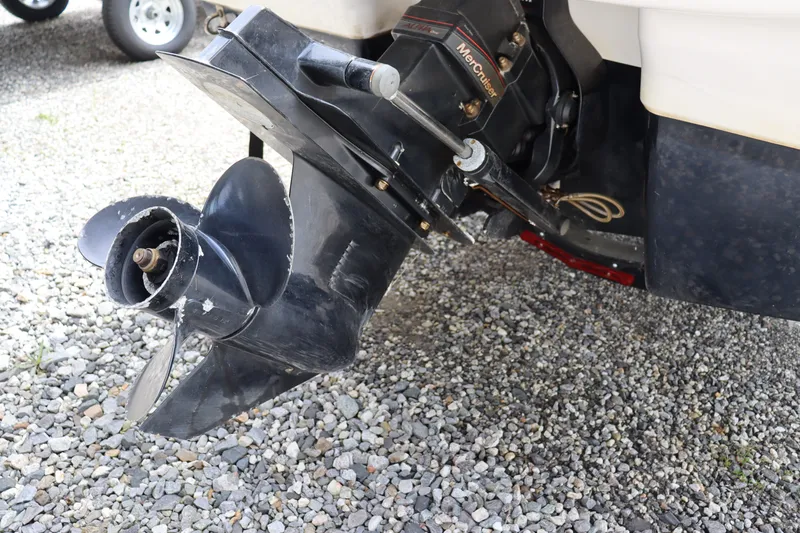 Slide: The Image of 2019 Chaparral 19 H2O boat motor and propeller on gravel. - 4