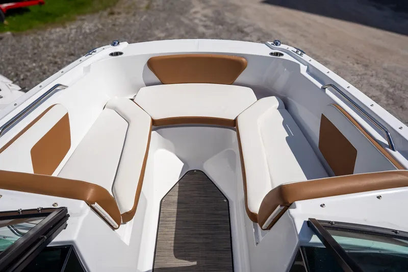 Slide: The Image of Interior of 2021 Four Winns HD1 LX with brown and white seating. - 7