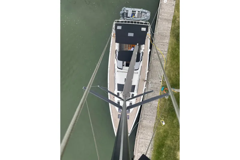 Slide: The Image of Aerial view of 2022 Dufour 530 yacht docked at a marina. - 28